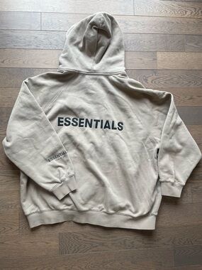 Essentials Beige Pullover Hoodie with Back Logo Patch